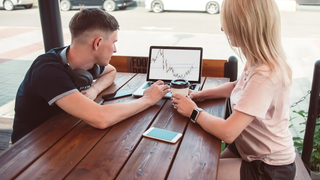 two-traders-analysing-trading-charts-for-market-trends