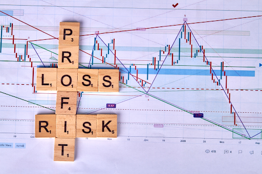 wooden-cubes-with-profit-risk-and-loss-words – PU Prime | More Than Trading wooden cubes with profit risk and loss words